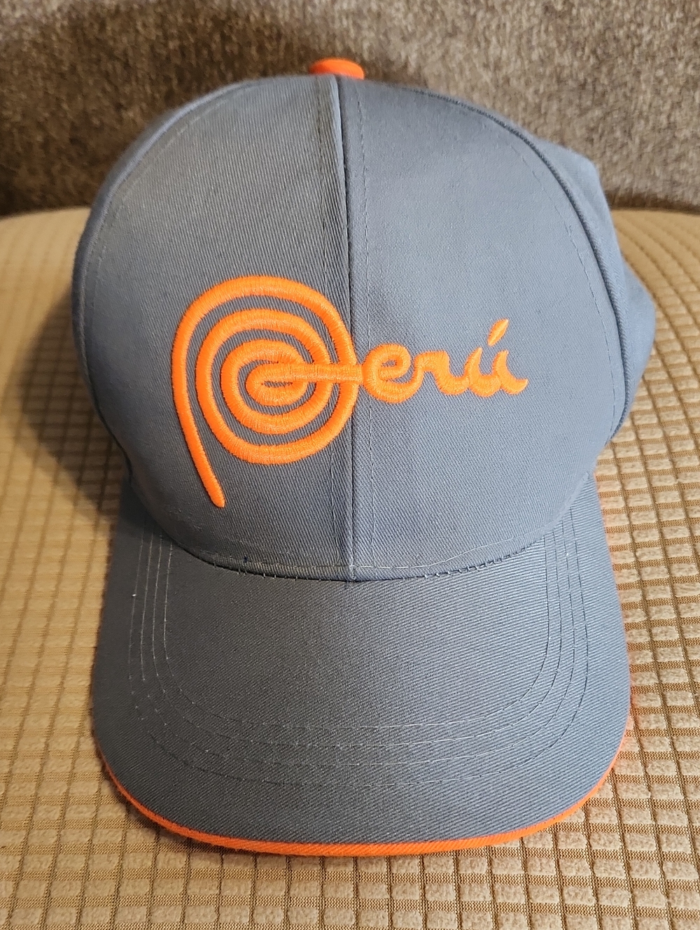 Gray Baseball Cap with Orange 'Perú' Embroidery